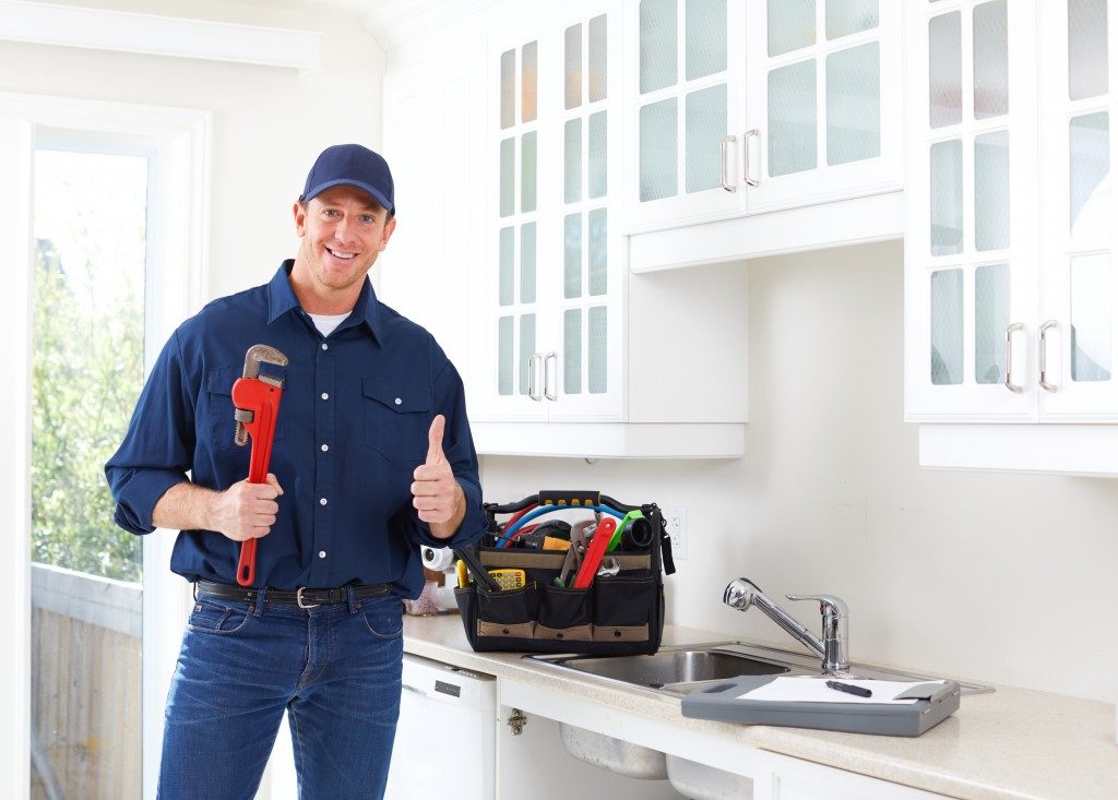 plumber giving a thumbs up