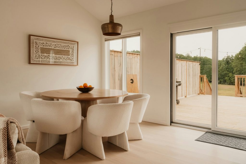 sliding door connecting a dining room and deck